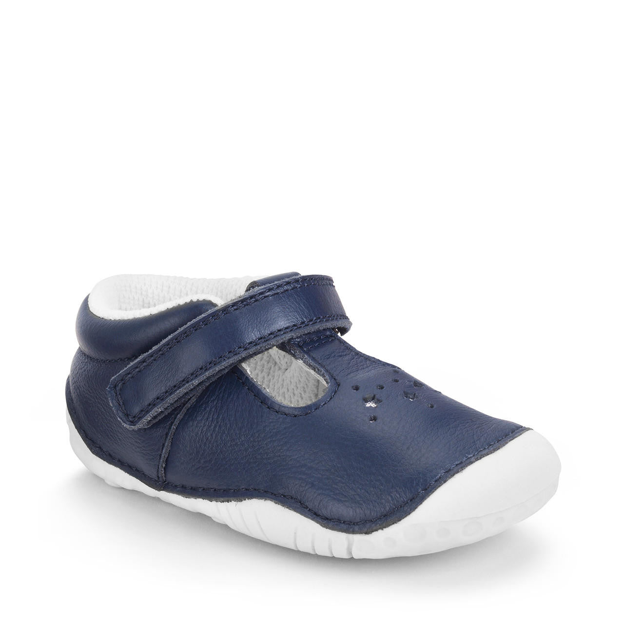 A girls T-Bar pre walker by Start-Rite, style Tumble, in navy leather with white sole, punch out star detail and velcro fastening. Angled view.