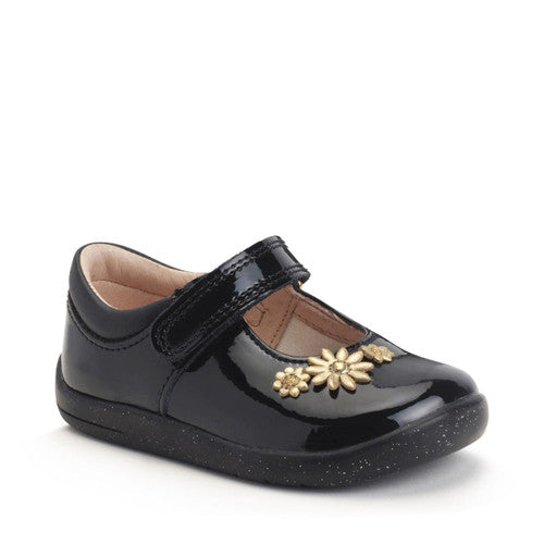 A girls Mary Jane shoe by Start Rite, style Fairy Tale, in black patent with gold flower detail and velcro fastening. Front angled view.