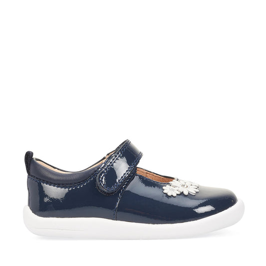 A girls Mary Jane shoe by Start-Rite, style Fairy Tale, in navy patent leather on white sole unit with white flower and diamante detail. Velcro fastening. Right side view.