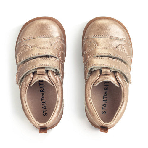 A pair of girls casual shoes by Start-Rite, style Maze, in rose gold leather. Double velcro fastening. Above view.