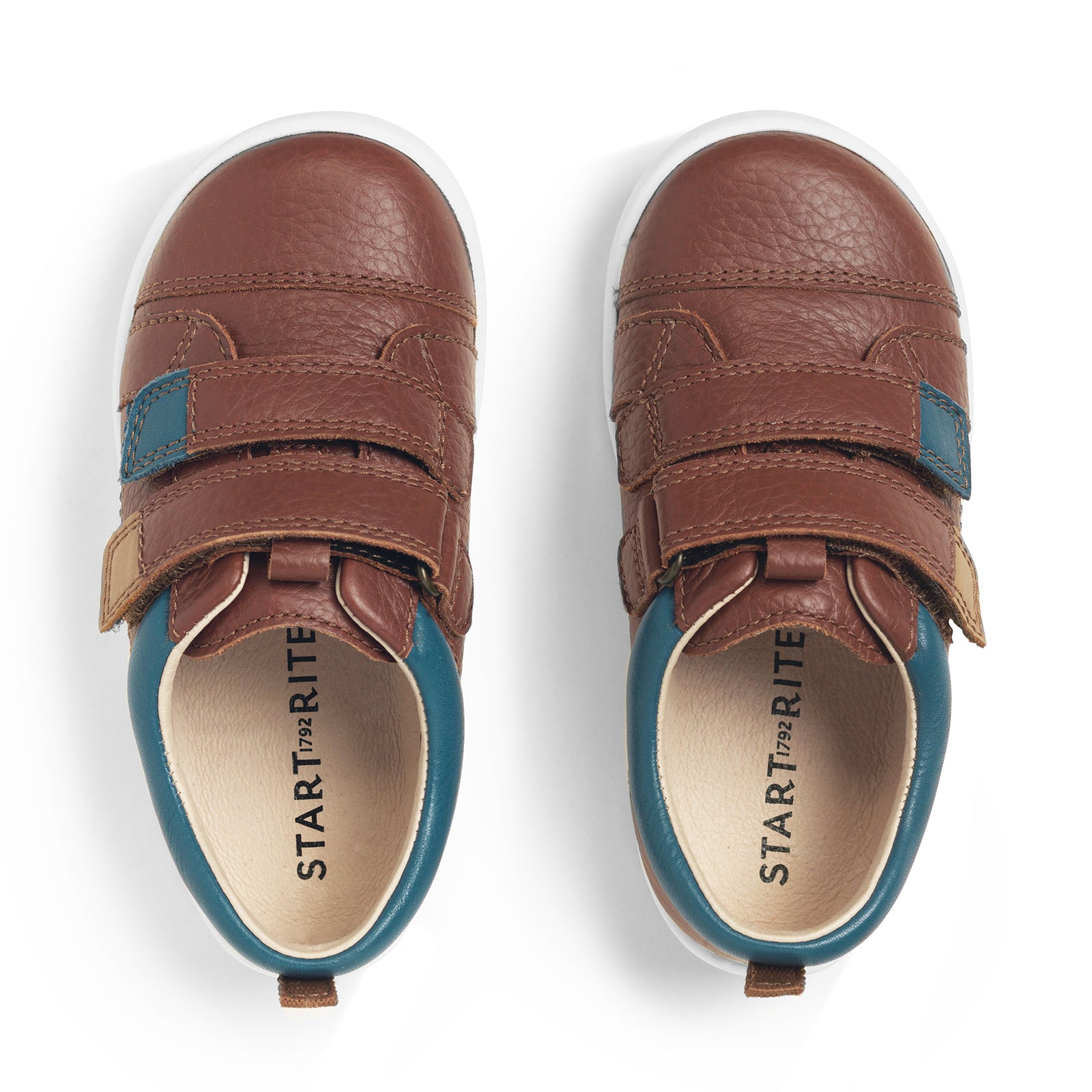 A pair of boy's casual shoes by Start-Rite, style Playhouse, in tan leather with blue/light tan trim on white sole unit with double velcro fastening. Right side view.