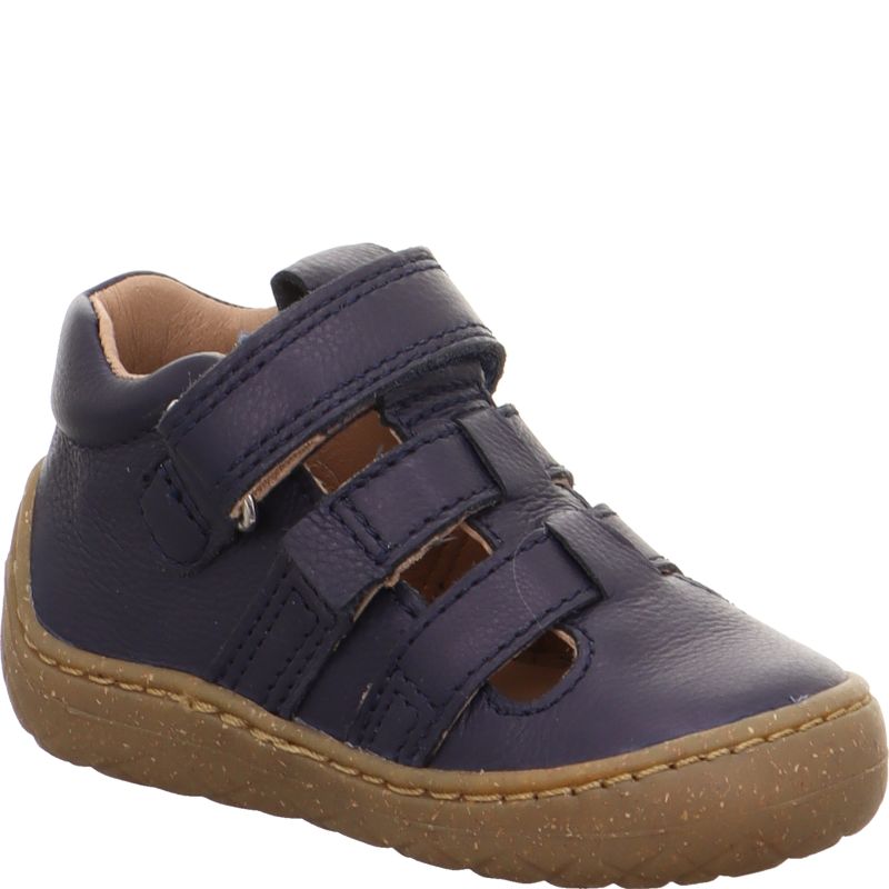 A boys first shoe by Superfit, style Saturnus, in Navy leather with cut out detail, toe bumper and velcro fastening. Inner right side view.