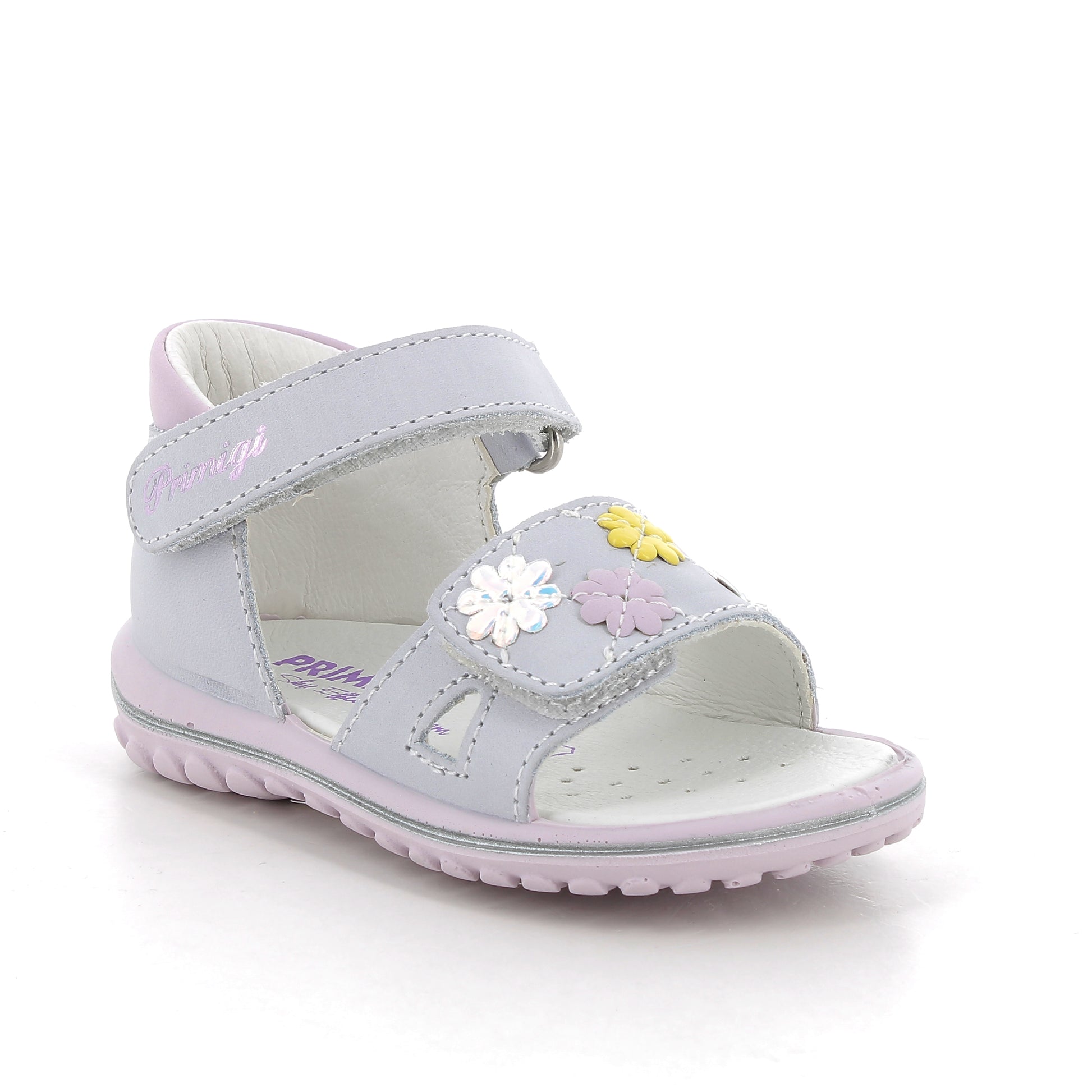 A girls sandal by Primigi, style Baby Sweet 586522, in grey leather with multi coloured flower trim. Angled view.