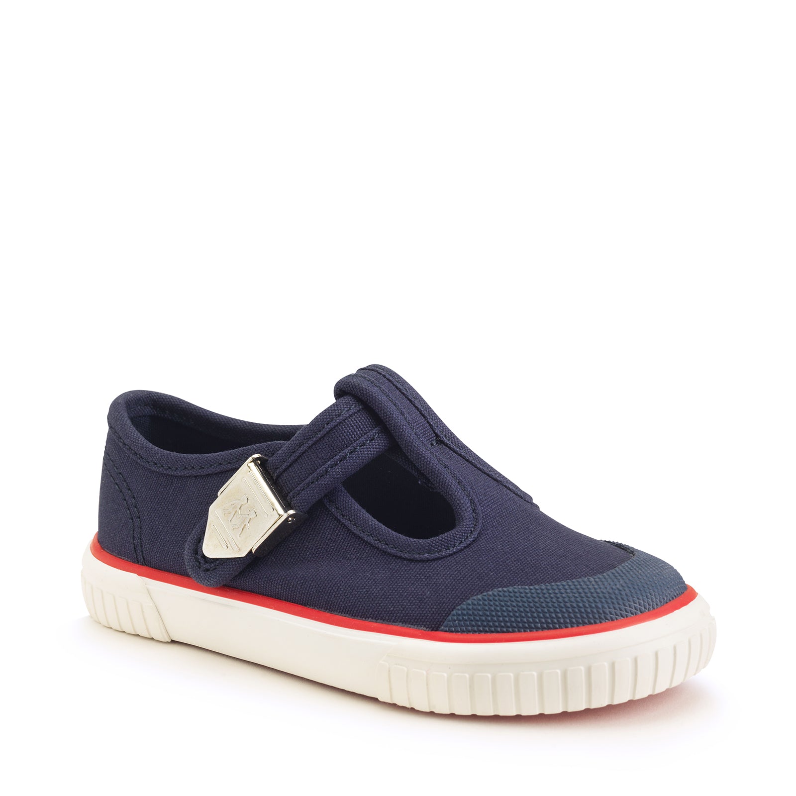A unisex canvas T-Bar shoe by Start-Rite, style Anchor, in navy, with white sole and red trim and silver buckle fastening. Angled view.