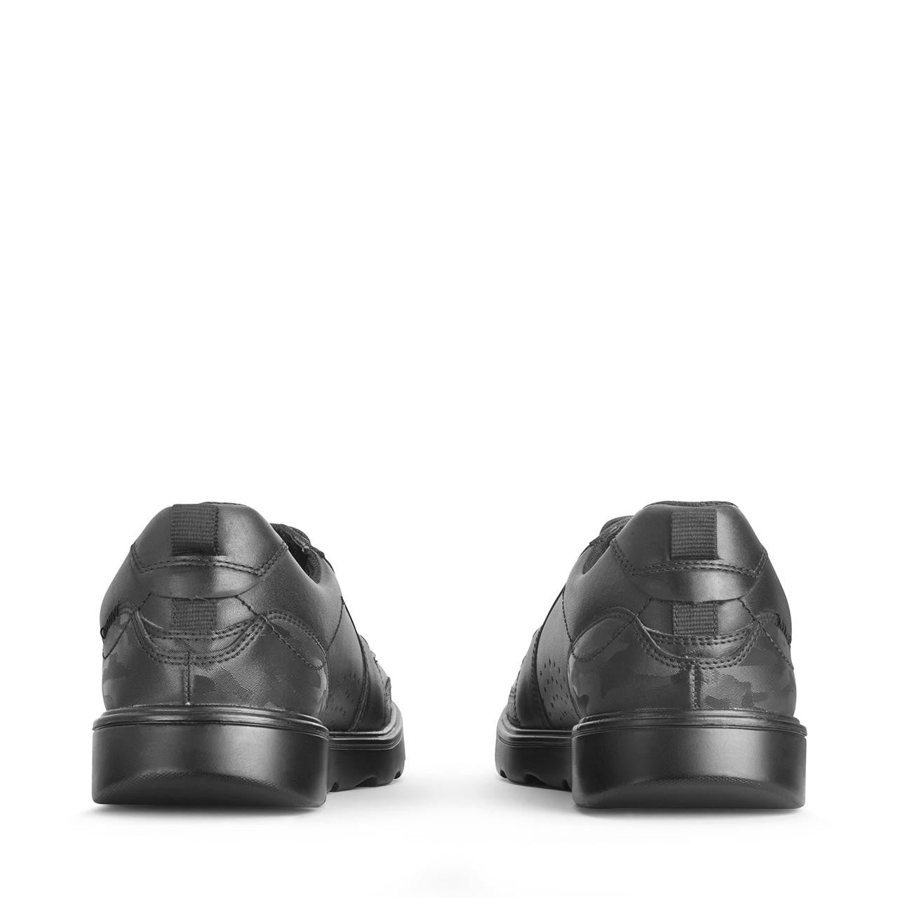 A pair of senior boys school shoes by Start-Rite, style Cadet, in black leather with lace up fastening. Back view.