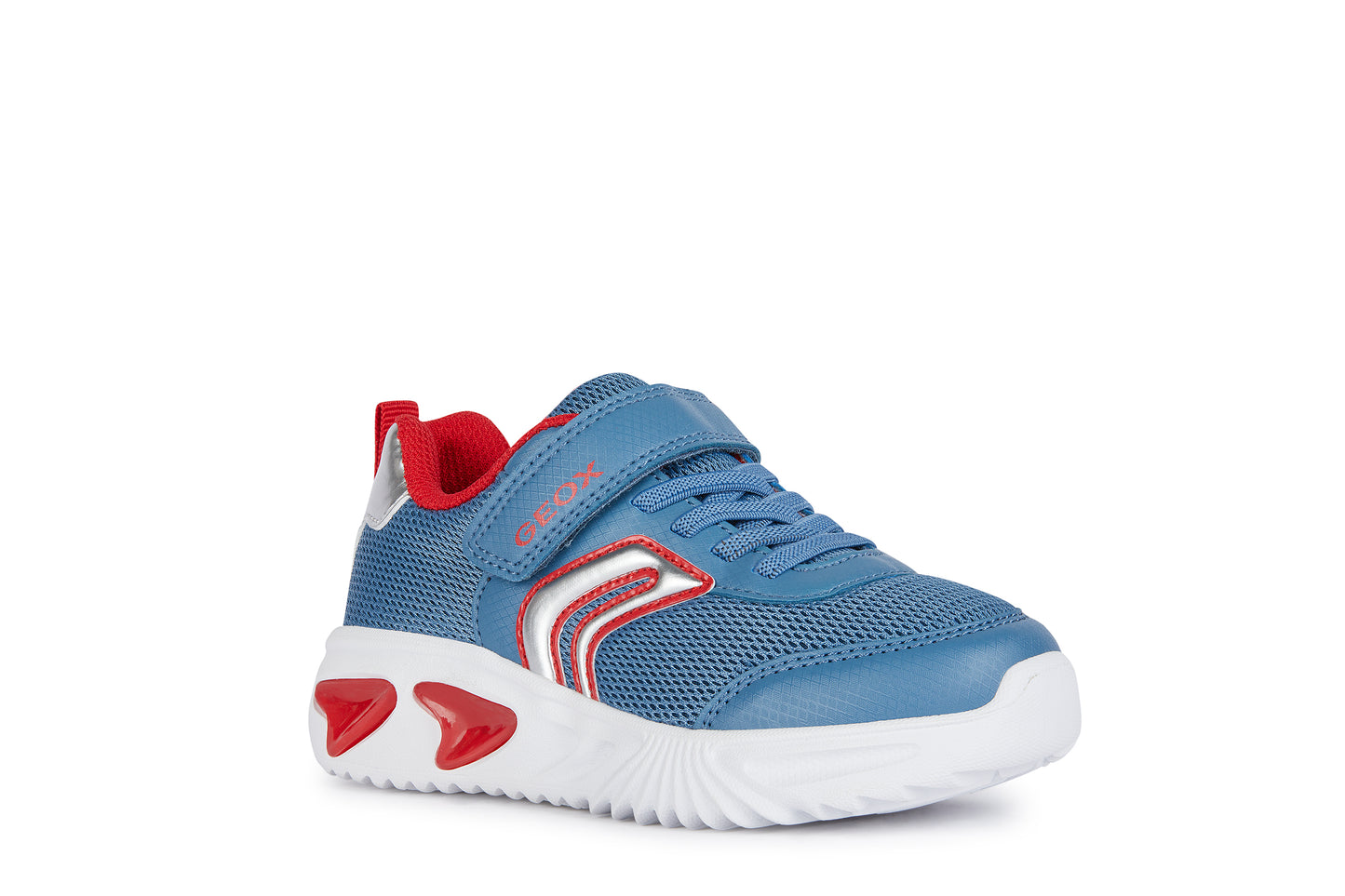 A boys light up trainer by Geox, style J Assister, in blue and red with velcro and bungee lace and velcro fastening. Angled view of right side.