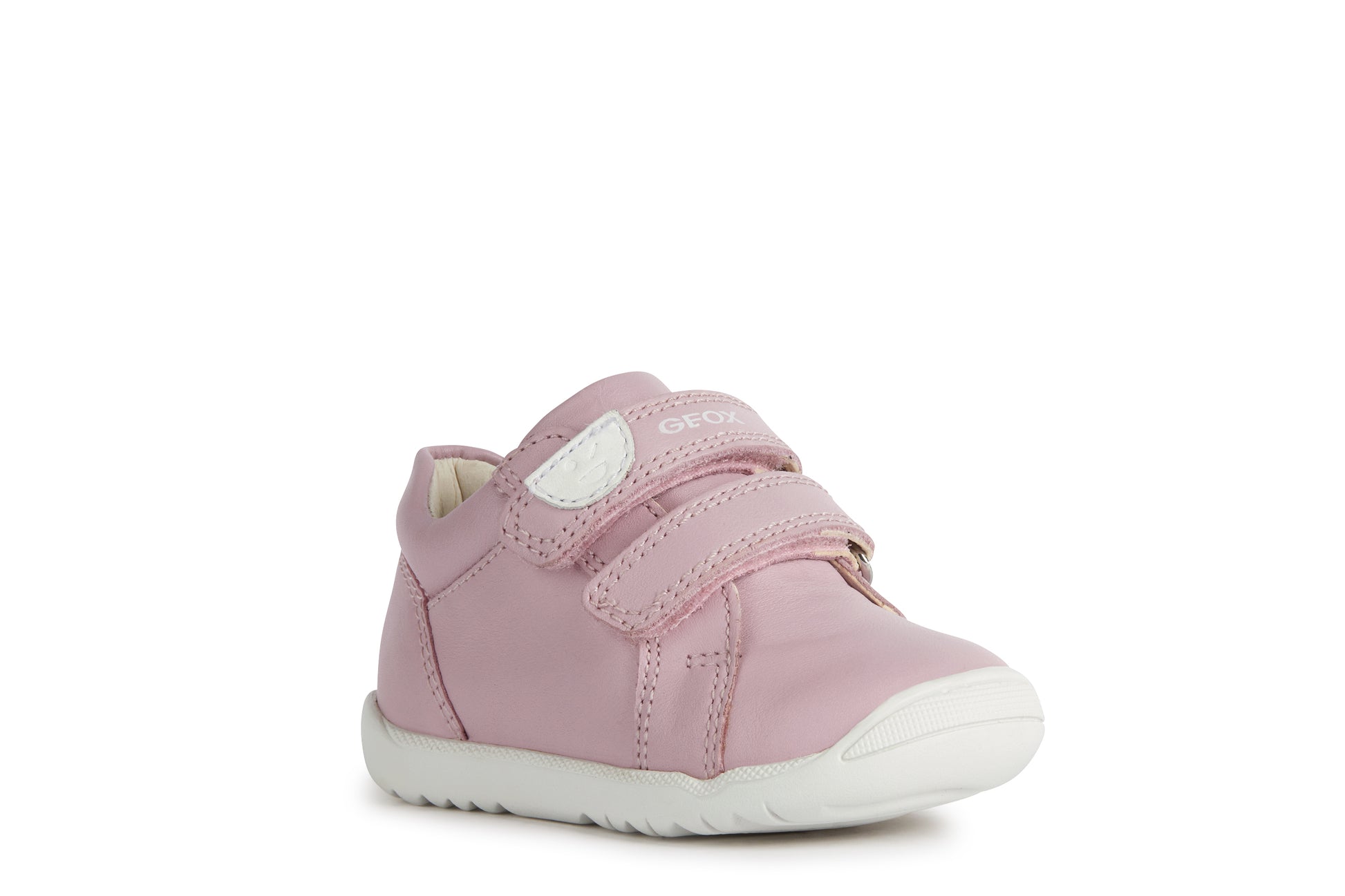 A girls shoe by Geox, style B Macchia, in pink leather with white trim and double velcro fastening. Angled view of right side.
