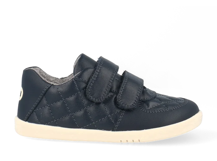 A boys casual shoe by Bobux, style Stitch, in navy leather ,with stitch detail and double velcro fastening. Right  side view.