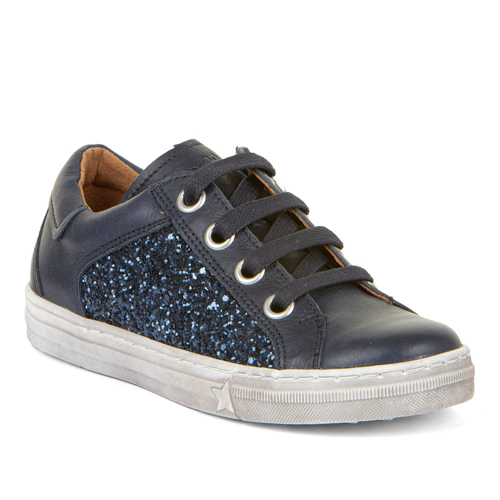 A girls casual shoe by Froddo, style Star G G3130252, in navy leather with side glitter panel and lace fastening. Angled view.