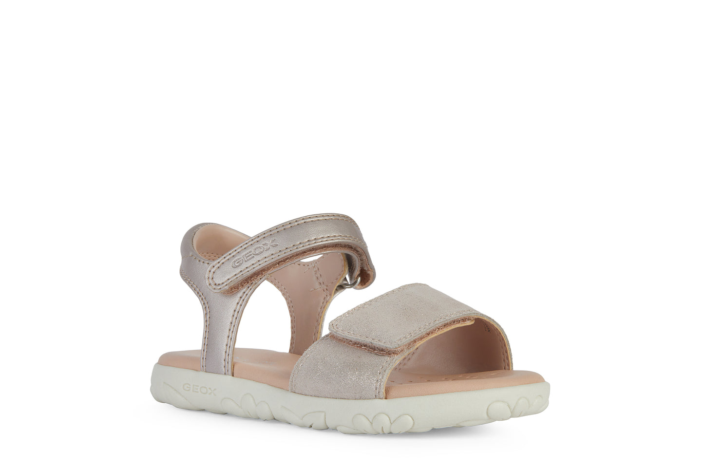 A girls open toe sandal by Geox, style J Haiti, in rose gold with velcro fastening. Angled right side view.