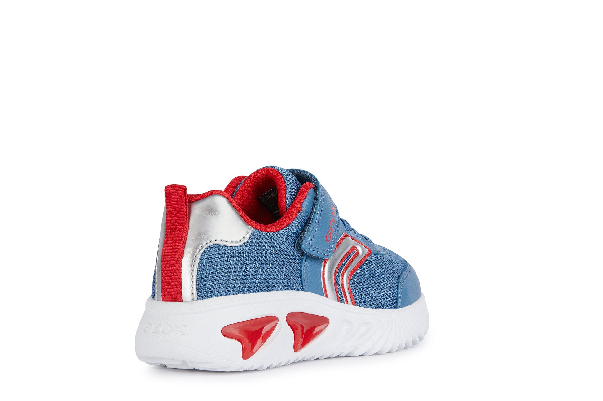 A boys light up trainer by Geox, style J Assister, in blue and red with velcro and bungee lace and velcro fastening. Angled view of right side.