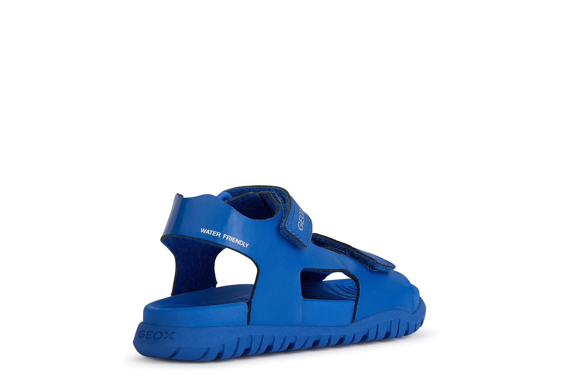 A unisex open toe synthetic water friendly sandal by Geox. Style Fusbetto in royal blue with two velcro fastenings. Back left angled  view.