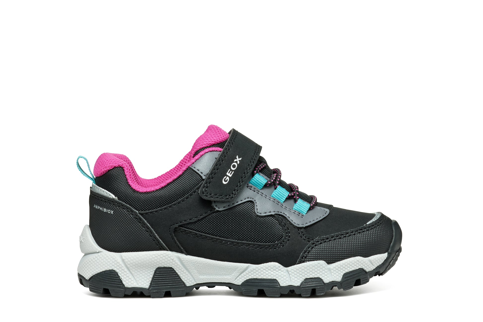 A girls waterproof trainer by Geox, style Magnetar in black, velcro fastening with bungee laces. Right side view.