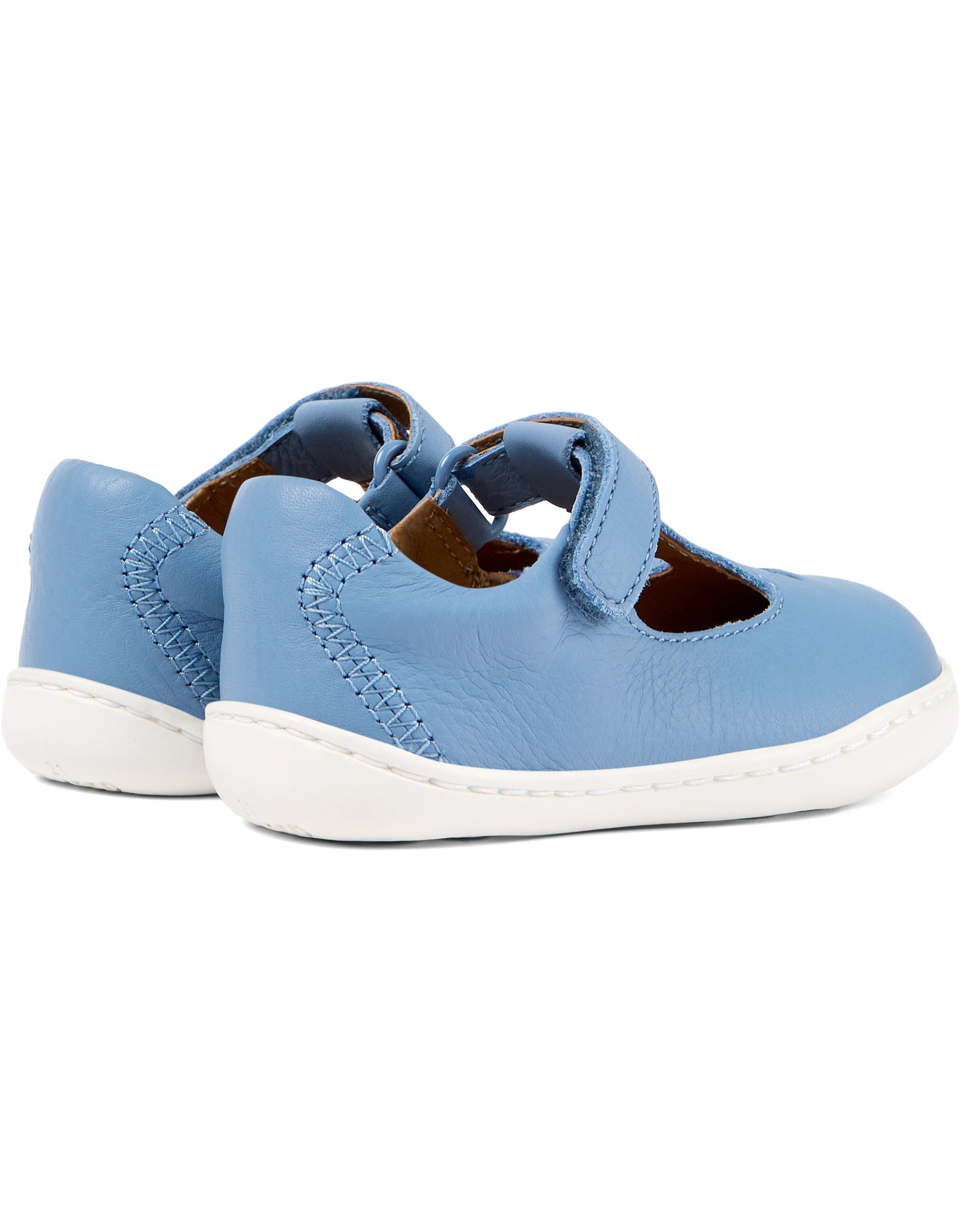 A T-bar shoe by Camper, style K800564-001, in blue with cut out fish detail. Velcro fastening. Rear angled view of a pair.