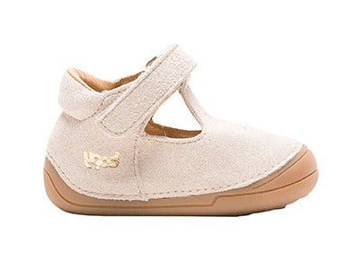 A girls t-bar shoe by Bopy, style Kilivel, in pale gold, with star punch out detail and velcro fastening. Right side view.