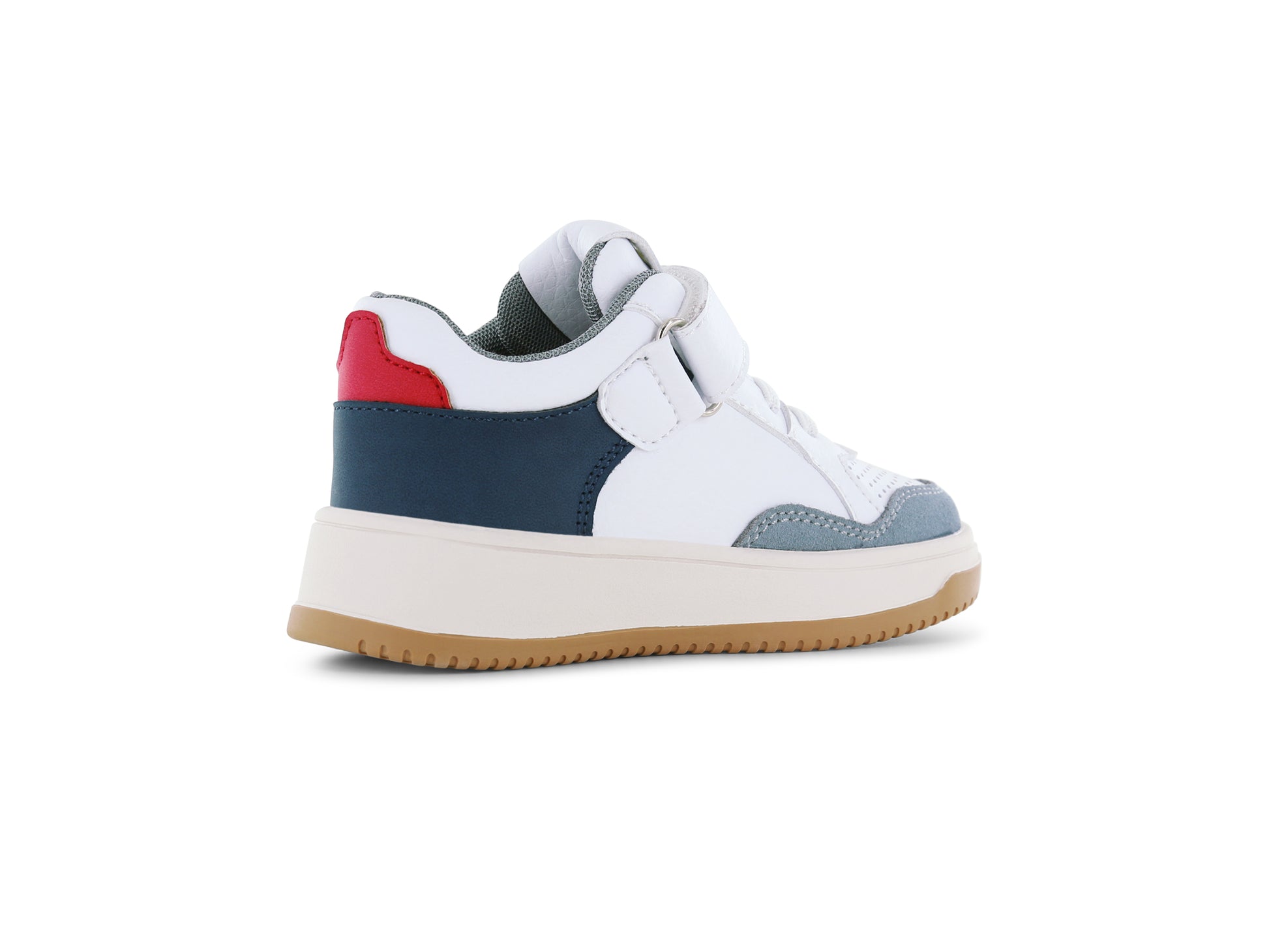 A boys trainer by Shoesme, style NO24S002-A, in white leather with navy, red and grey trim set on cream sole unit.
Velcro and elastic lace fastening.
Angled left side view.