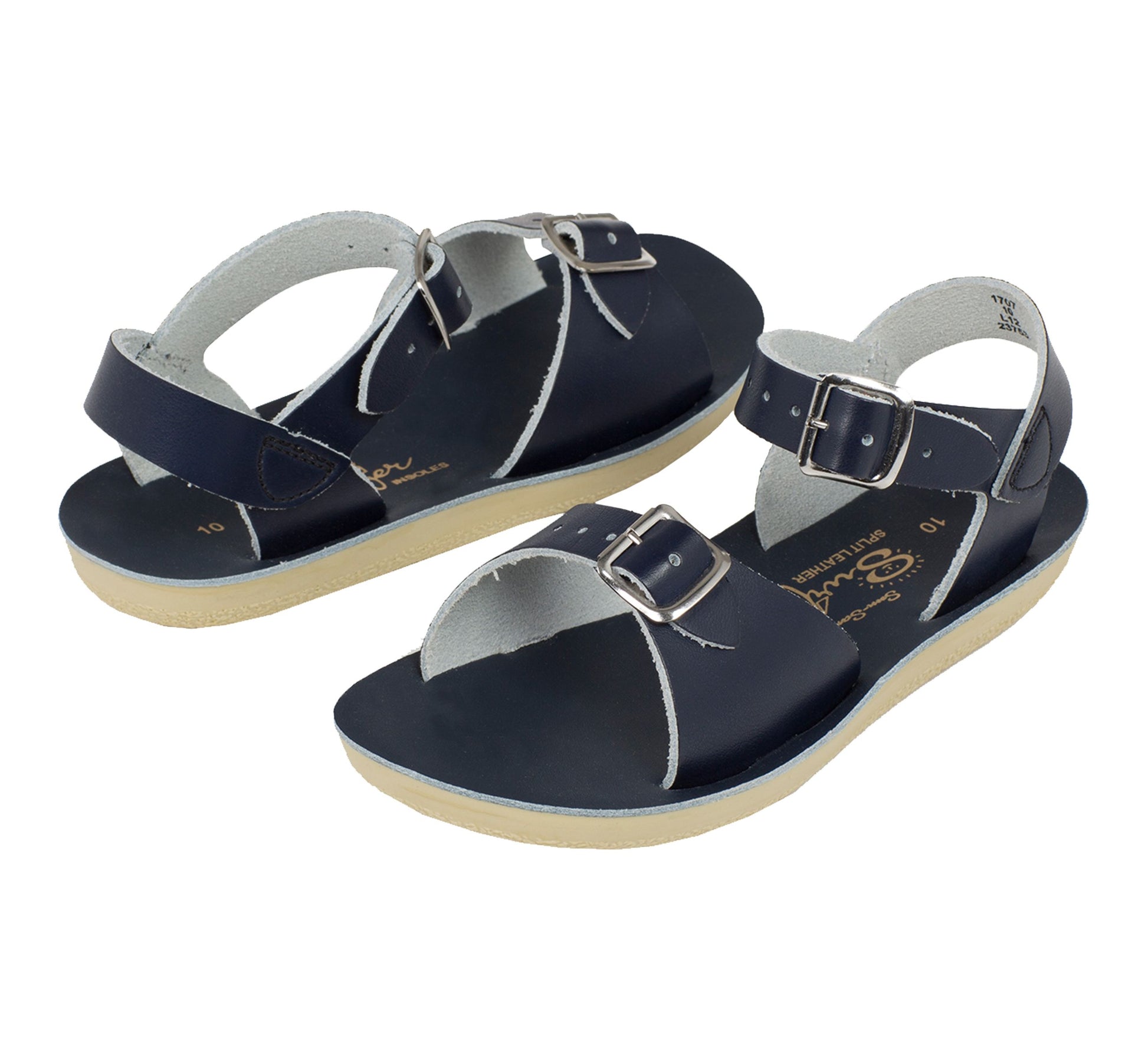 A unisex sandal by Salt Water Sandals in navy with double buckle fastening across the instep and around the ankle. Open Toe and Sling-back. Pair view.