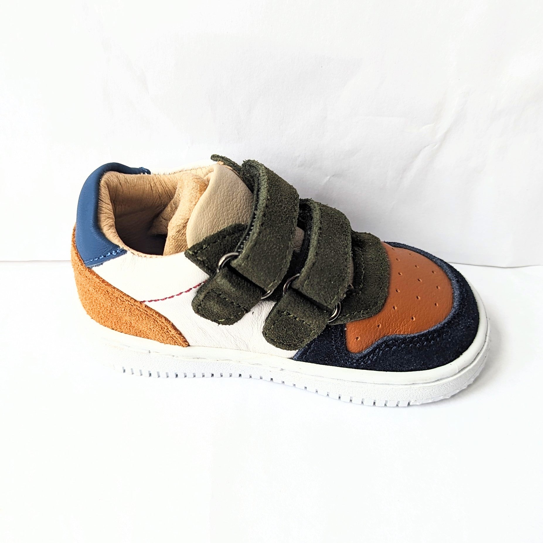 A boys trainer by Shoesme, style BN23W003-D, in white, green, tan and navy leather/nubuck with double velcro fastening. Left side view.