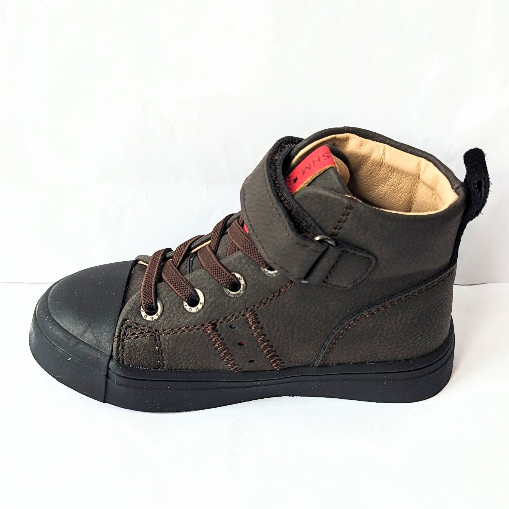 A hi-top unisex boot by Shoesme, style SH23W024-D, with toe bumper and elastic lace and velcro fastening. View of left side.