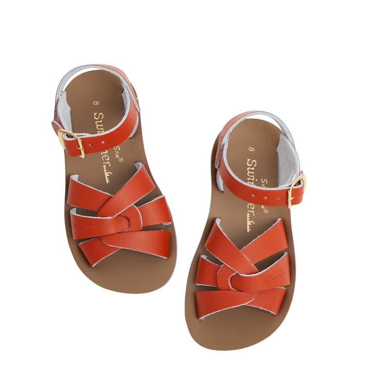 A unisex swimmer design sandal by Salt Water Sandals in paprika with buckle fastening around the ankle. Open Toe and Sling-back with woven detail across the instep. Top view.