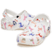 A classic clog by Crocs, style Tod in white with unicorn print. Right side view, left angled view.