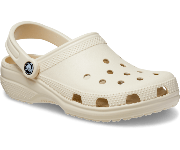 A unisex classic clog by Crocs, style Todd in bone, Right angled view.