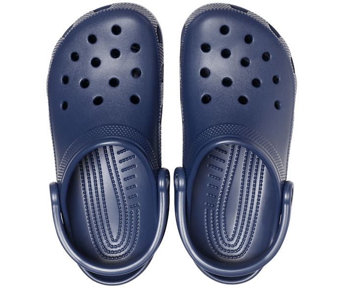 A unisex classic clog by Crocs, style Todd in navy. Above view of a pair.