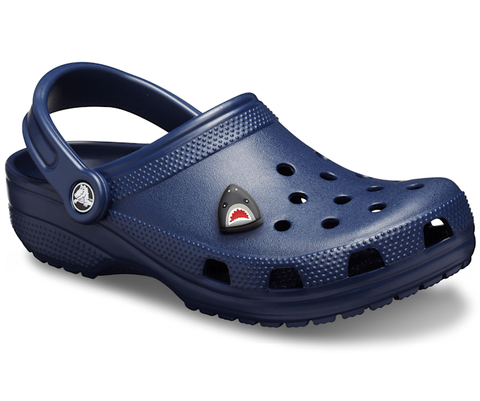 A unisex classic clog by Crocs, style Todd in navy. Right angled view.