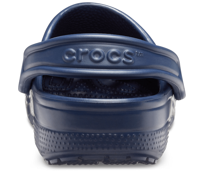 A unisex classic clog by Crocs, style Todd in navy. Right view of the back.