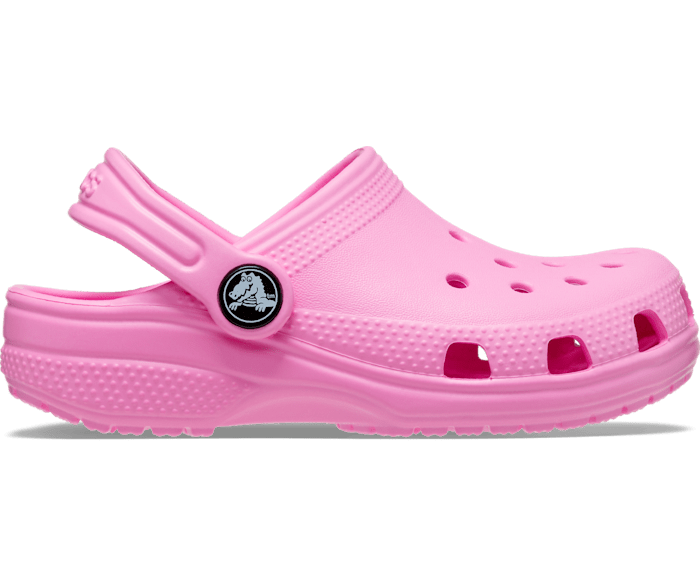 A girls classic clog by Crocs, style Todd in pink. Right side view.