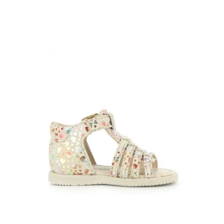 A girls open toe sandal by Bopy, style Reabou, in white with a multi colour foil  heart pattern. Buckle fastening around the ankle. Inside side view.