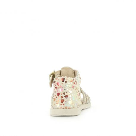 A girls open toe sandal by Bopy, style Reabou, in white with a multi colour foil  heart pattern. Buckle fastening around the ankle. Back view.