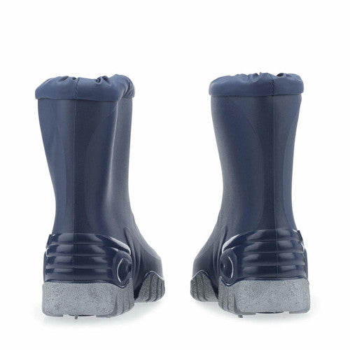 A unisex pair of wellies by Start-Rite, style Baby Mudbuster, in blue and grey with fur lining and drawstring fastening. View from back.