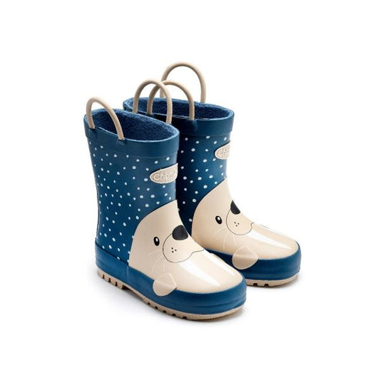 A pair of fleece lined wellies by Chipmunks, style Waldo Walrus, in blue multi walrus design. Angled view of right side.