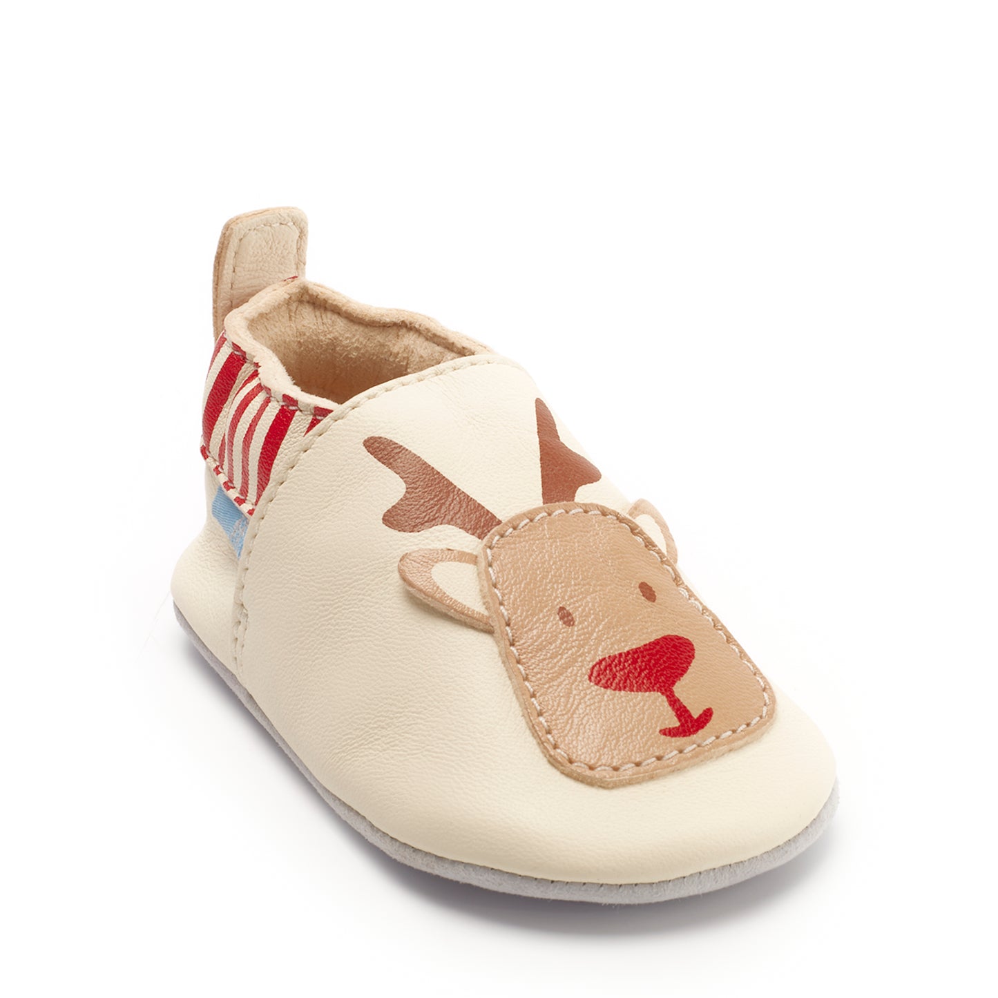 A unisex pram shoe by Start-Rite , style Fable , A slip on Cream and Red Leather Reindeer shoe. Angled view.