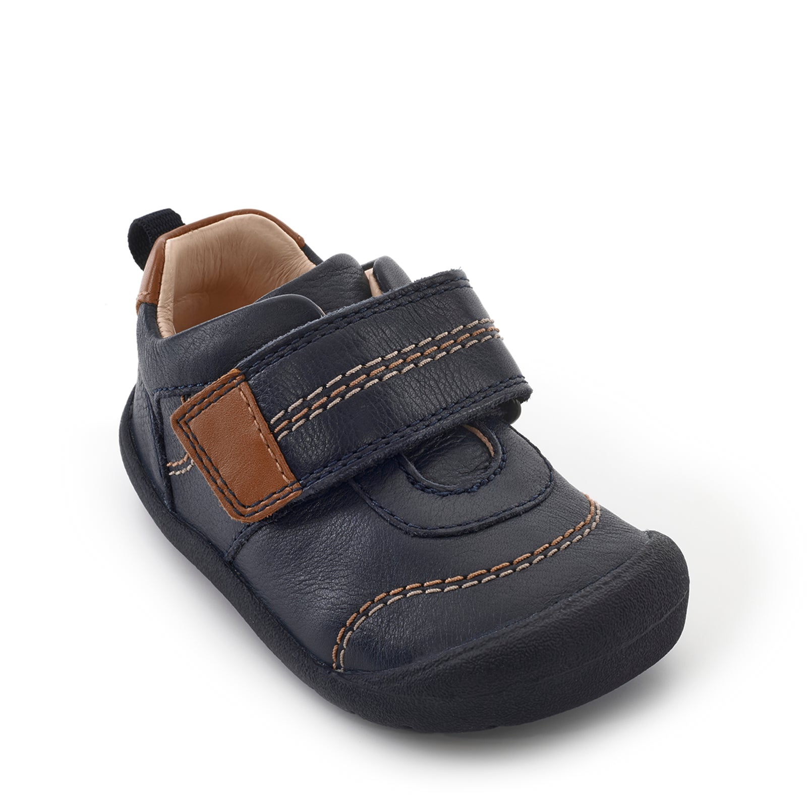 A boys first shoe by Start-Rite, style Footprint, in navy with tan trim and stitch detailing, velcro fastening. Angled view.