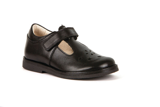 A girls t-bar school shoe by Froddo, style Evia, in black leather with velcro fastening. Angled view. 