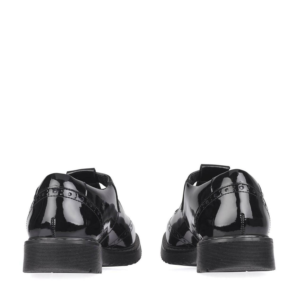 A girls T-Bar school shoe by Start Rite,style Imagine, in black patent with buckle fastening. Back view.