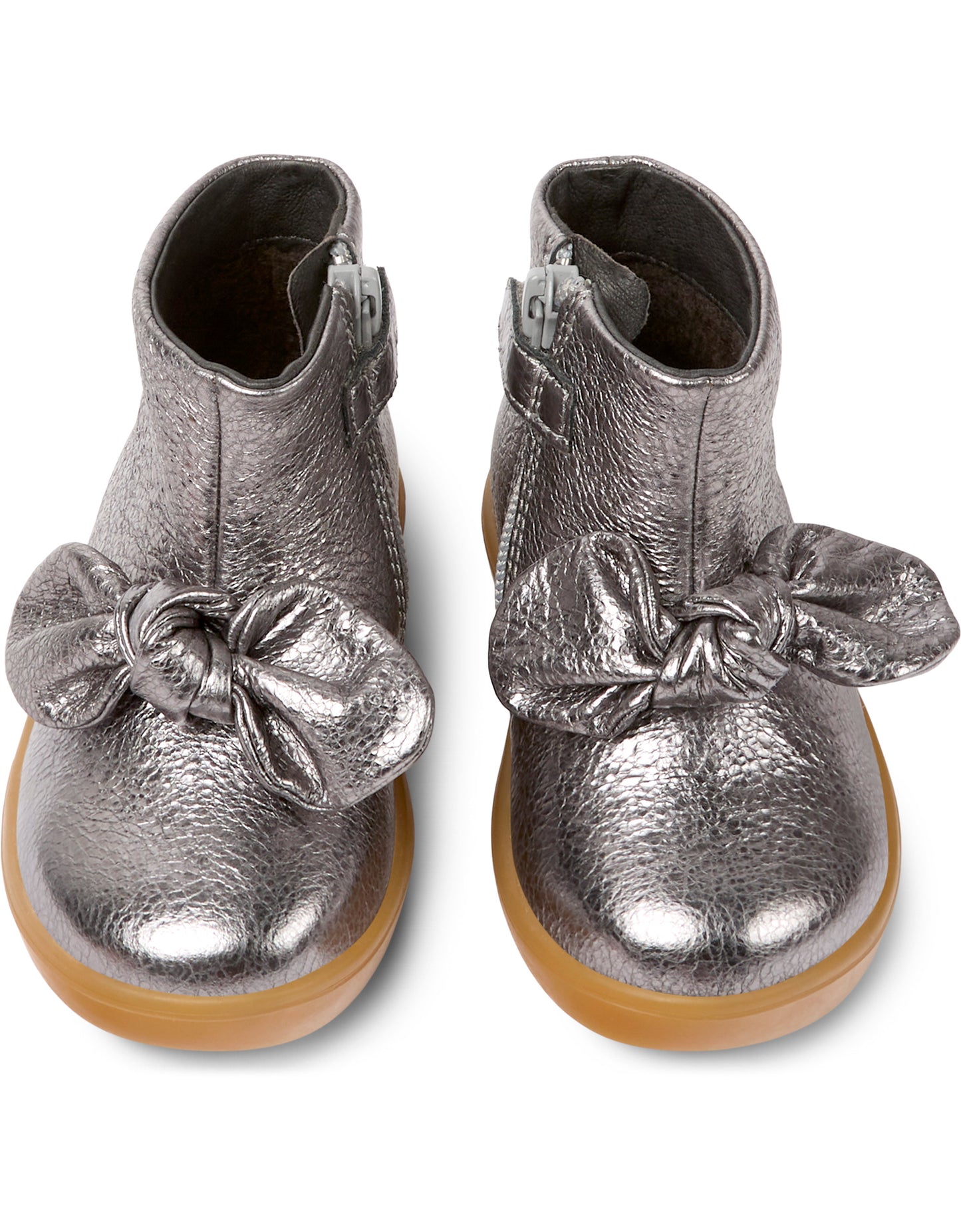 A pair of girls ankle boots by Camper, style K900267-006 in dark silver with bow front and zip fastening. Front view.,